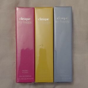 Brand new in package bundle of 3 clinic. My happy perfume